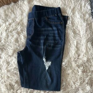 Distressed pull on jeans . Size Xl
